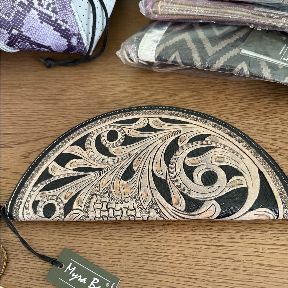 Myra Bag Black and Tan Clutch with Elegant Design